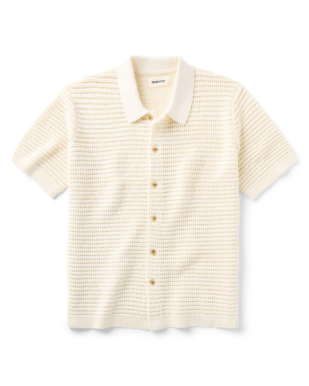 The Monterey Sweater Polo in Vintage White Crochet with short sleeves on a white background