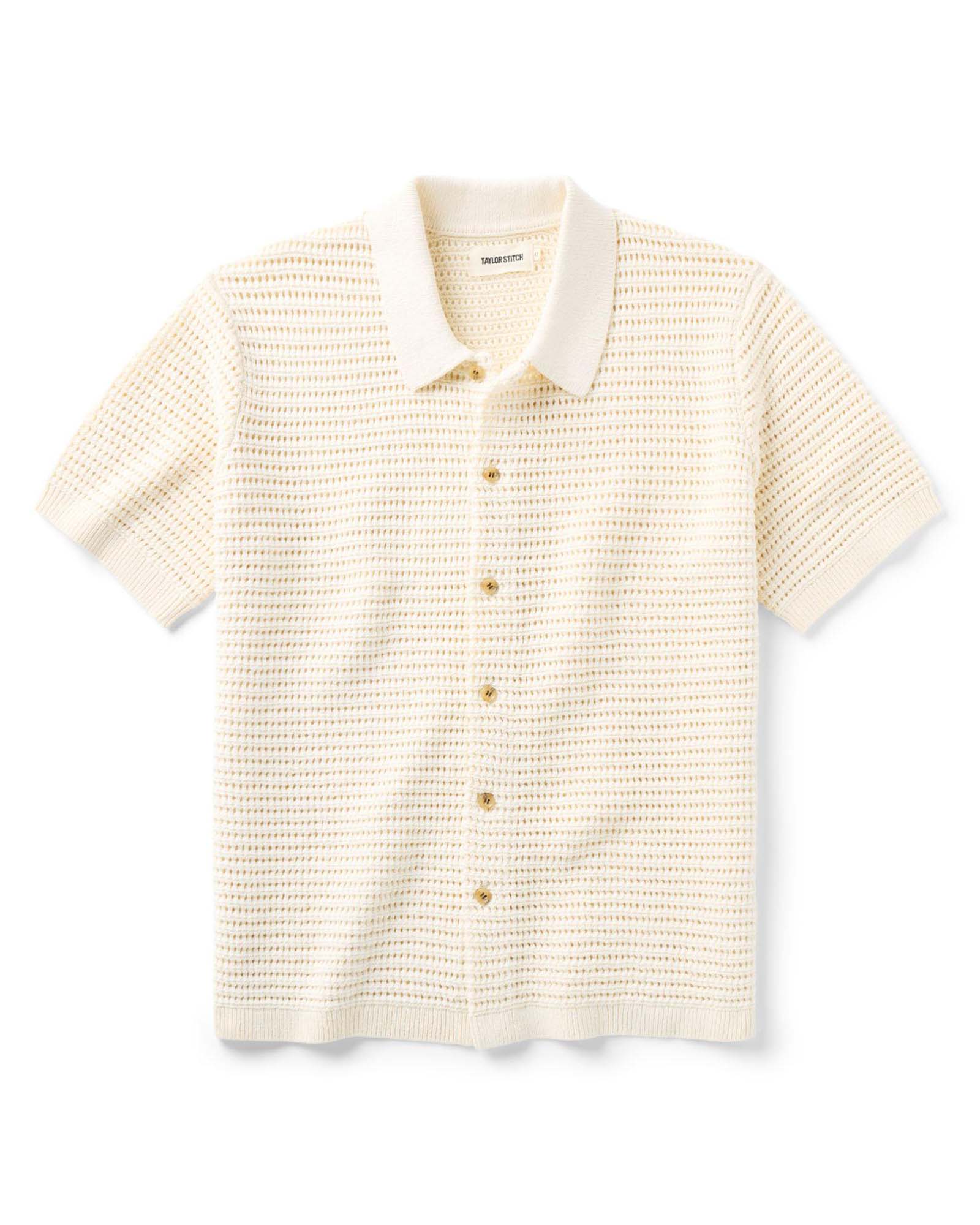 The Monterey Sweater Polo in Vintage White Crochet with short sleeves on a white background