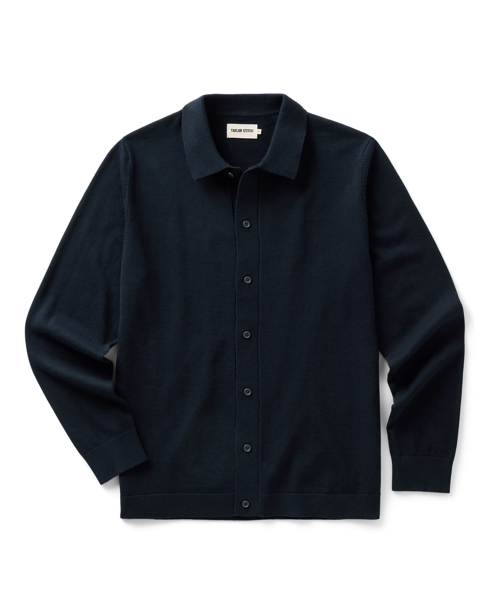 Taylor Stitch's The Nichols Polo in Nocturne Cotton Cashmere laid flat against a white background.