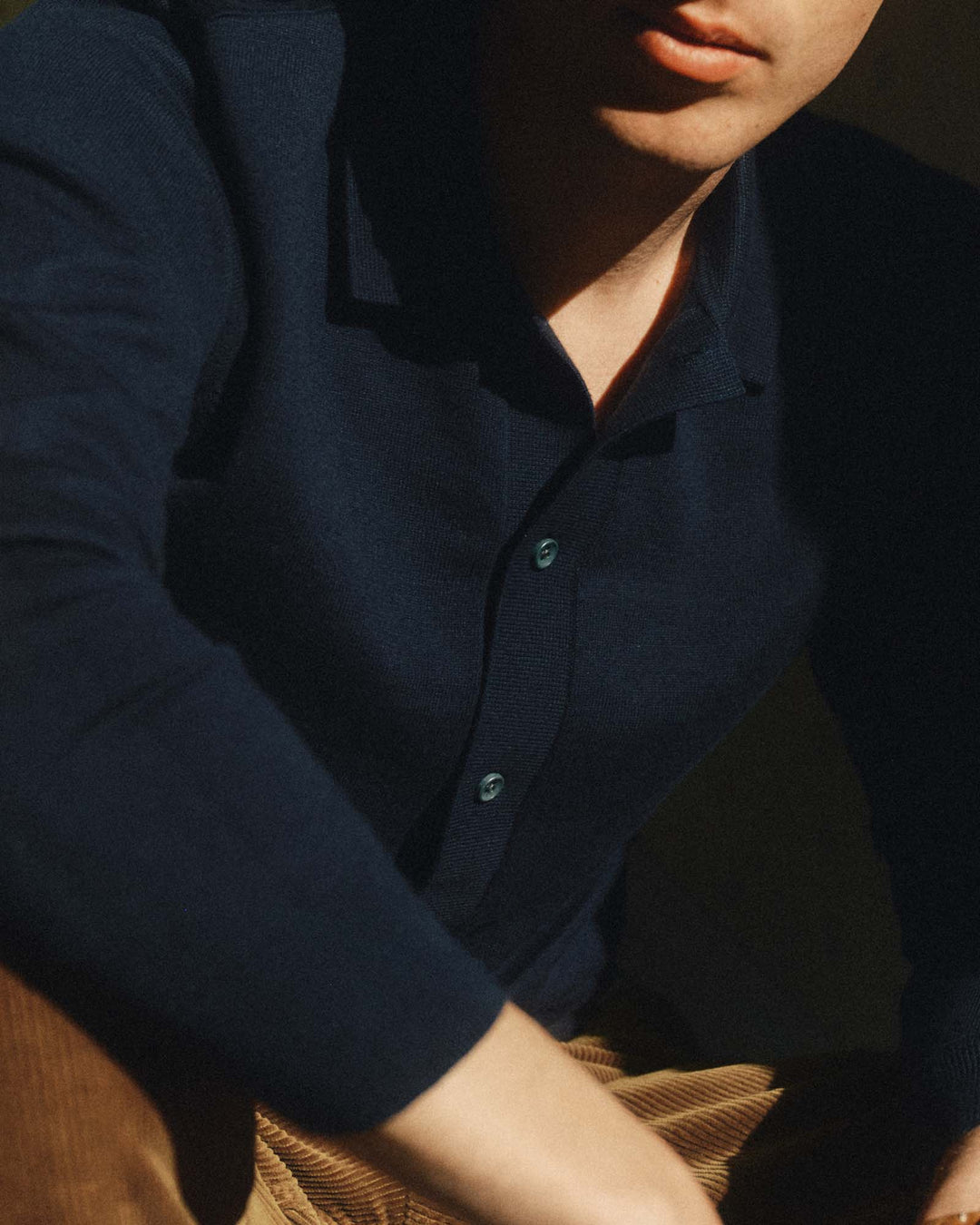 A close-up of a person wearing Taylor Stitch&