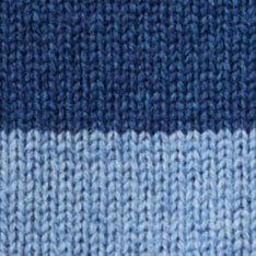 Close-up of a knitted fabric showing two horizontal color bands: a dark navy blue top section and a lighter sky blue bottom section.