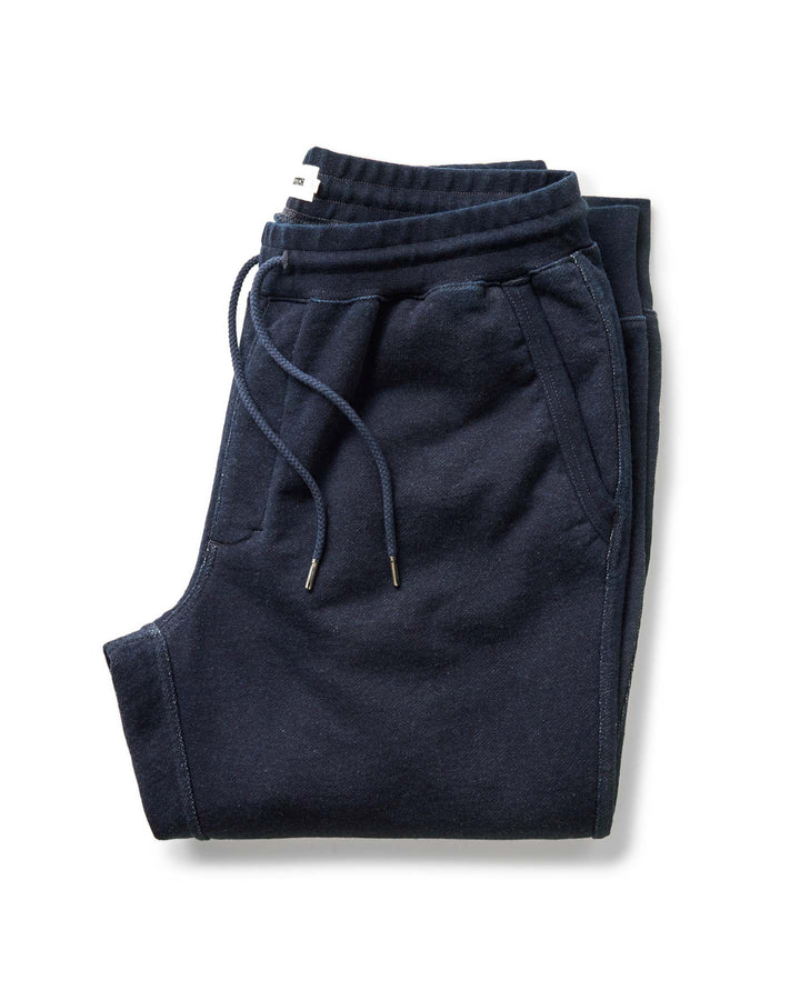 Folded Taylor Stitch Sunset Pant in Rinsed Indigo Terry on a white background
