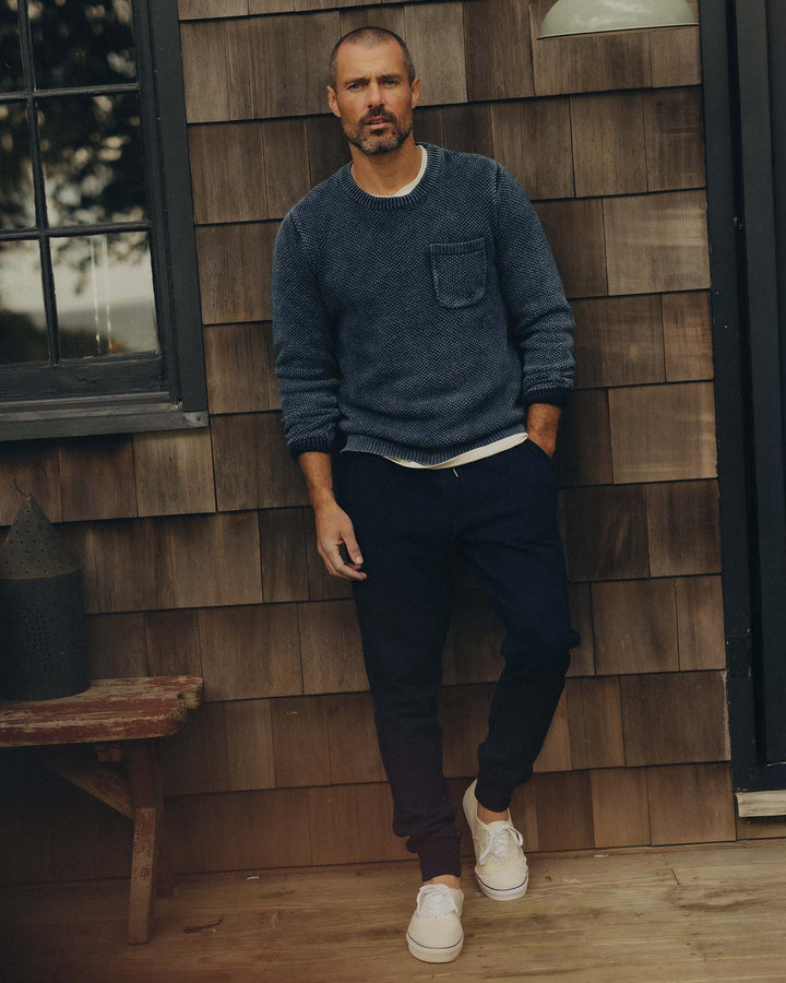 Man wearing a blue sweater and Taylor Stitch&