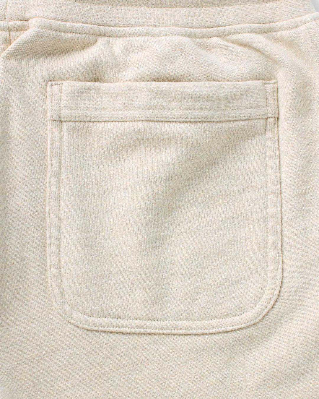 Close-up of The Sunset Short in Heather Oat Terry with back pocket