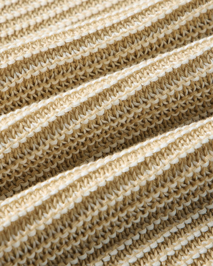Close-up of The Valencia Sweater Polo
in Sand Stripefabric texture