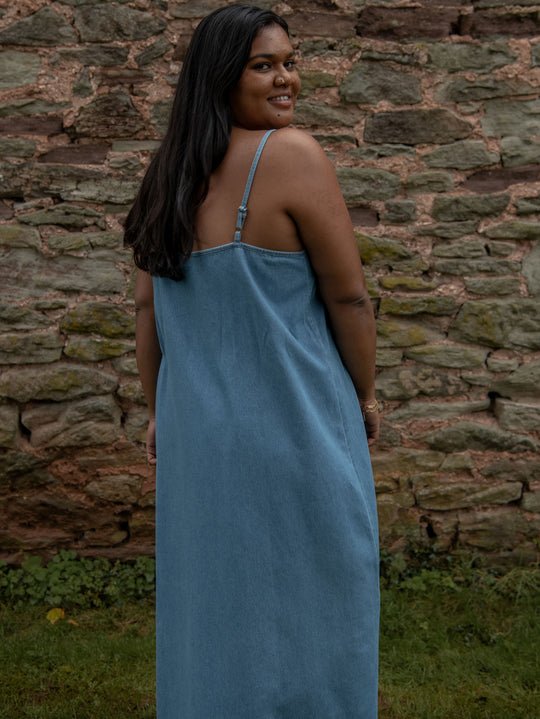 The Simple Folk Denim Cami Dress Back view with side look at Echo Market