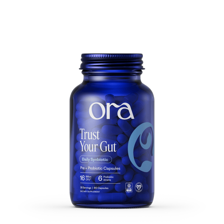 Blue bottle of Ora Trust Your Gut supplement on a white background
