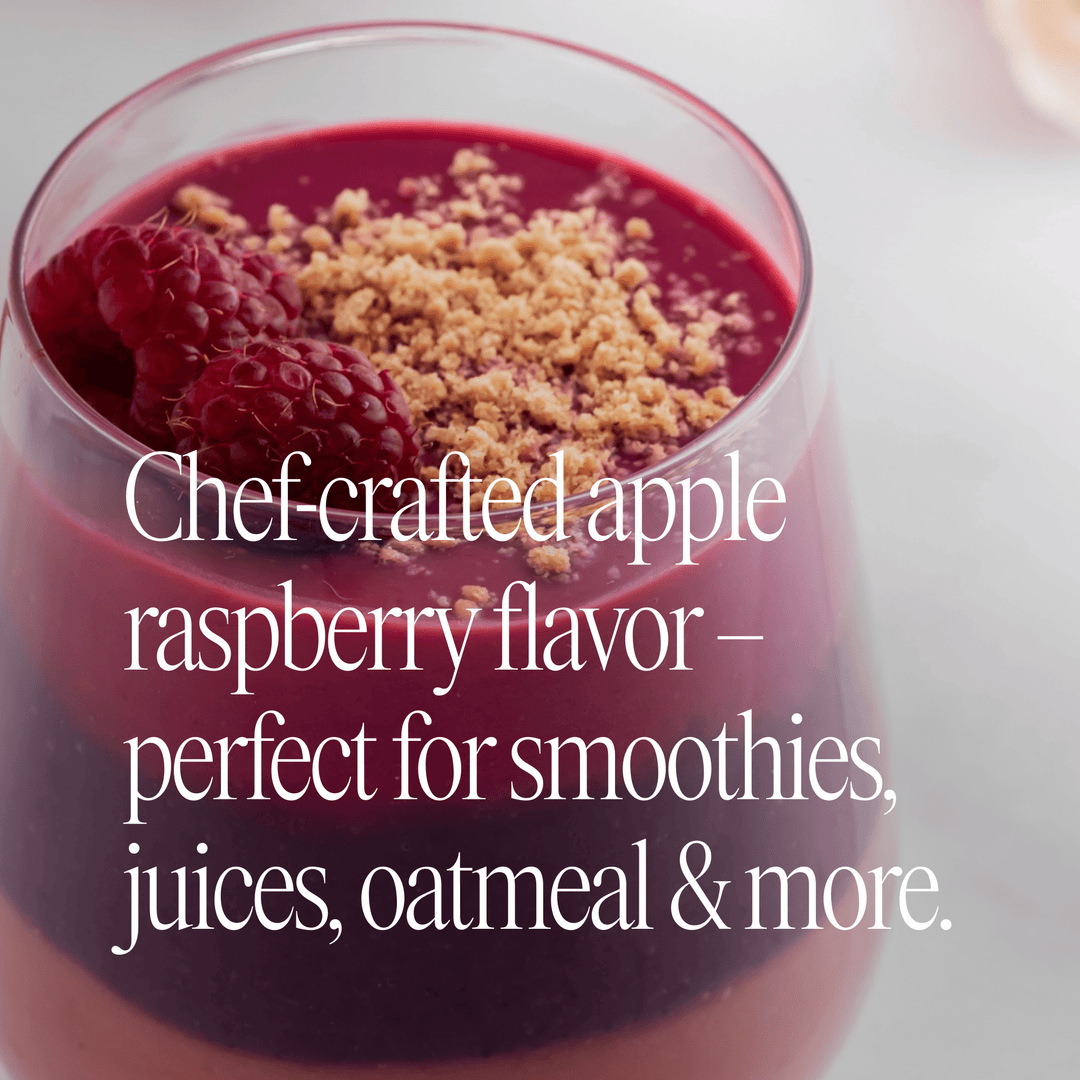 Glass of raspberry smoothie with text about chef-crafted apple raspberry flavor