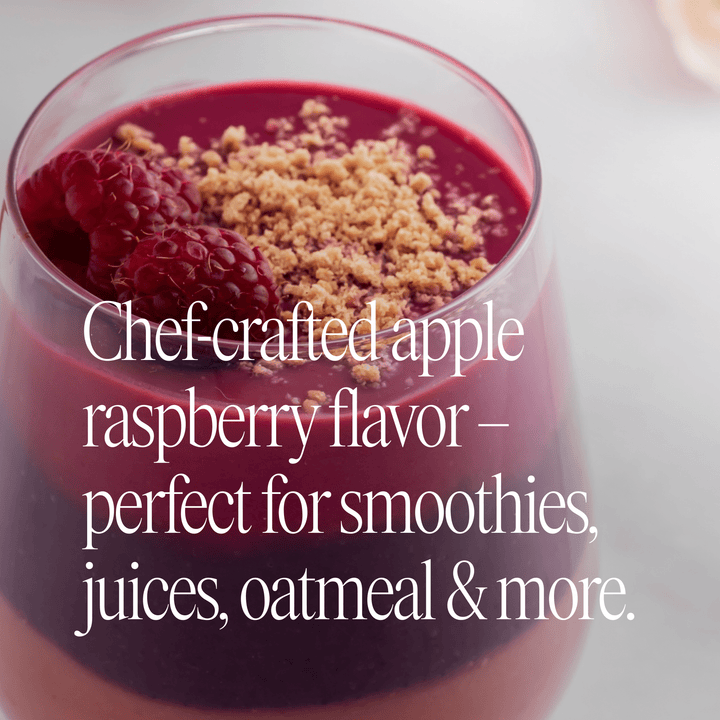 Glass of raspberry smoothie with text about chef-crafted apple raspberry flavor