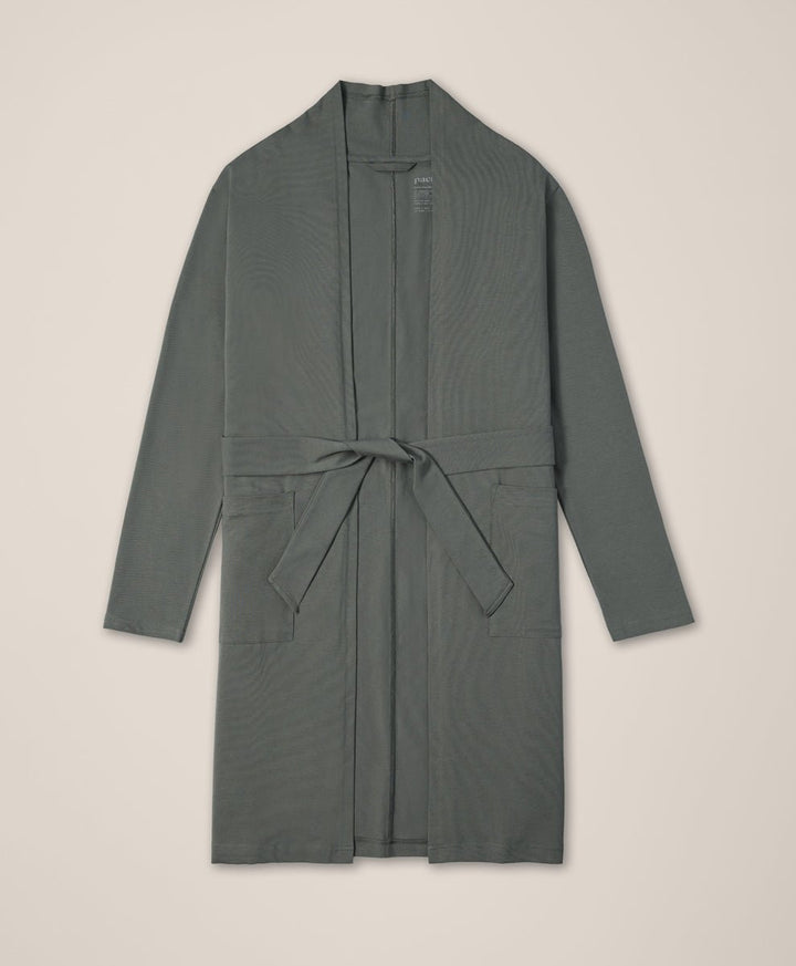 castor green robe with a belt on a beige background