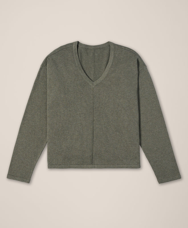 Gray long-sleeve shirt on a beige background