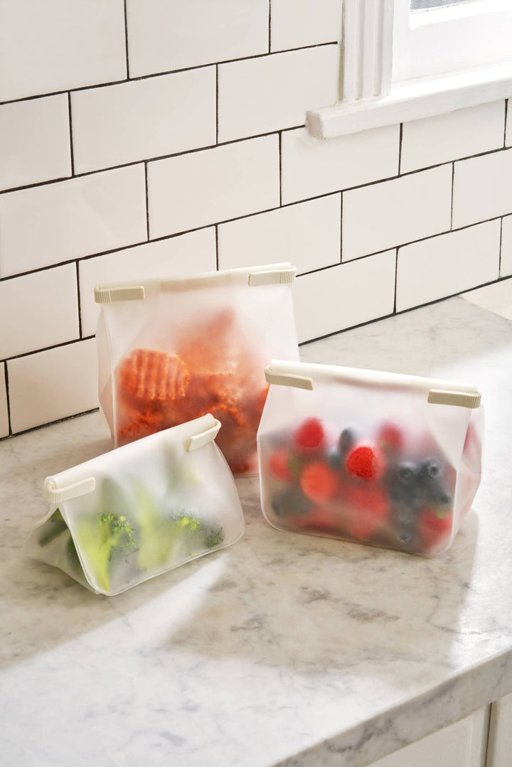 Roll Tight Storage Bag Set - Three sizes of bags closed and filled with fruits and vegetables - Echo Market
