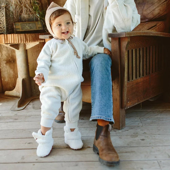 Sherpa Baby Stay-On Booties - Alabaster - Shown on baby model standing up - Echo Market